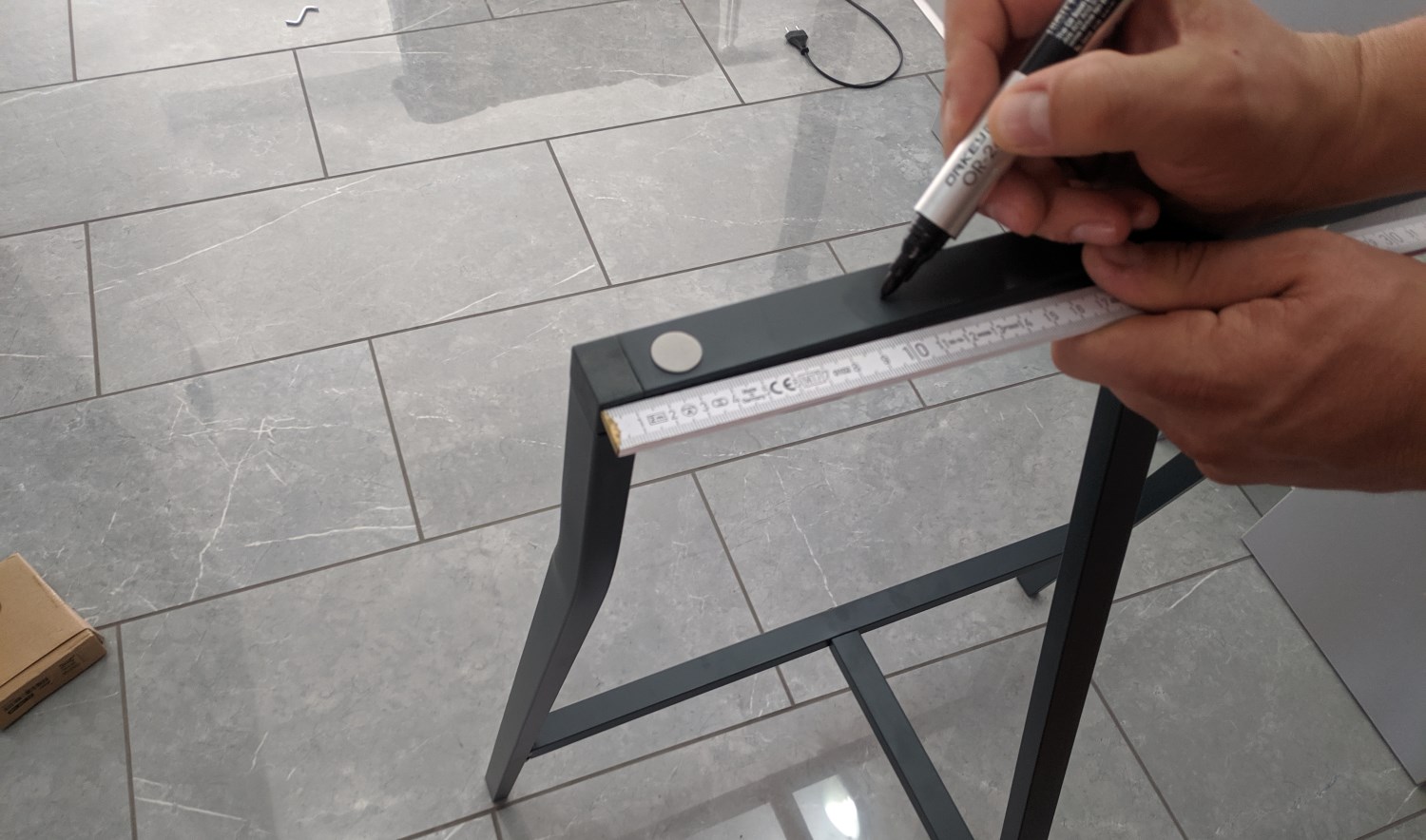 Marking the location for the mounting holes